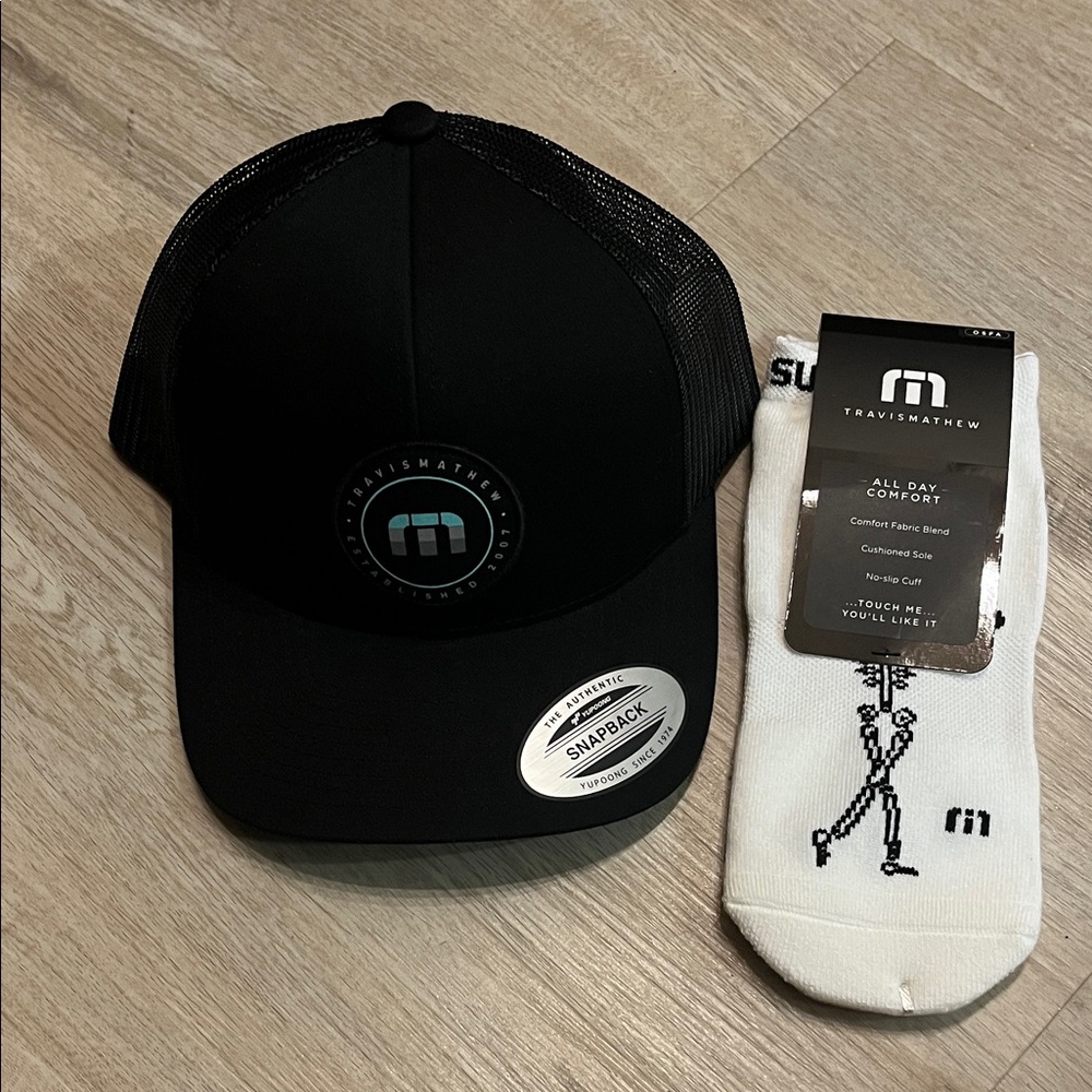 TRAVIS MATHEW black trucker patch hat and no-slip cuff socks